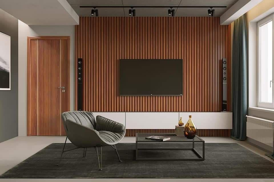 Necowood low-VOC acoustic WPC wall panels in a modern open office with biophilic design – WELL and LEED v5 ready, featuring warm oak matte finish and micro-cellular sound absorption